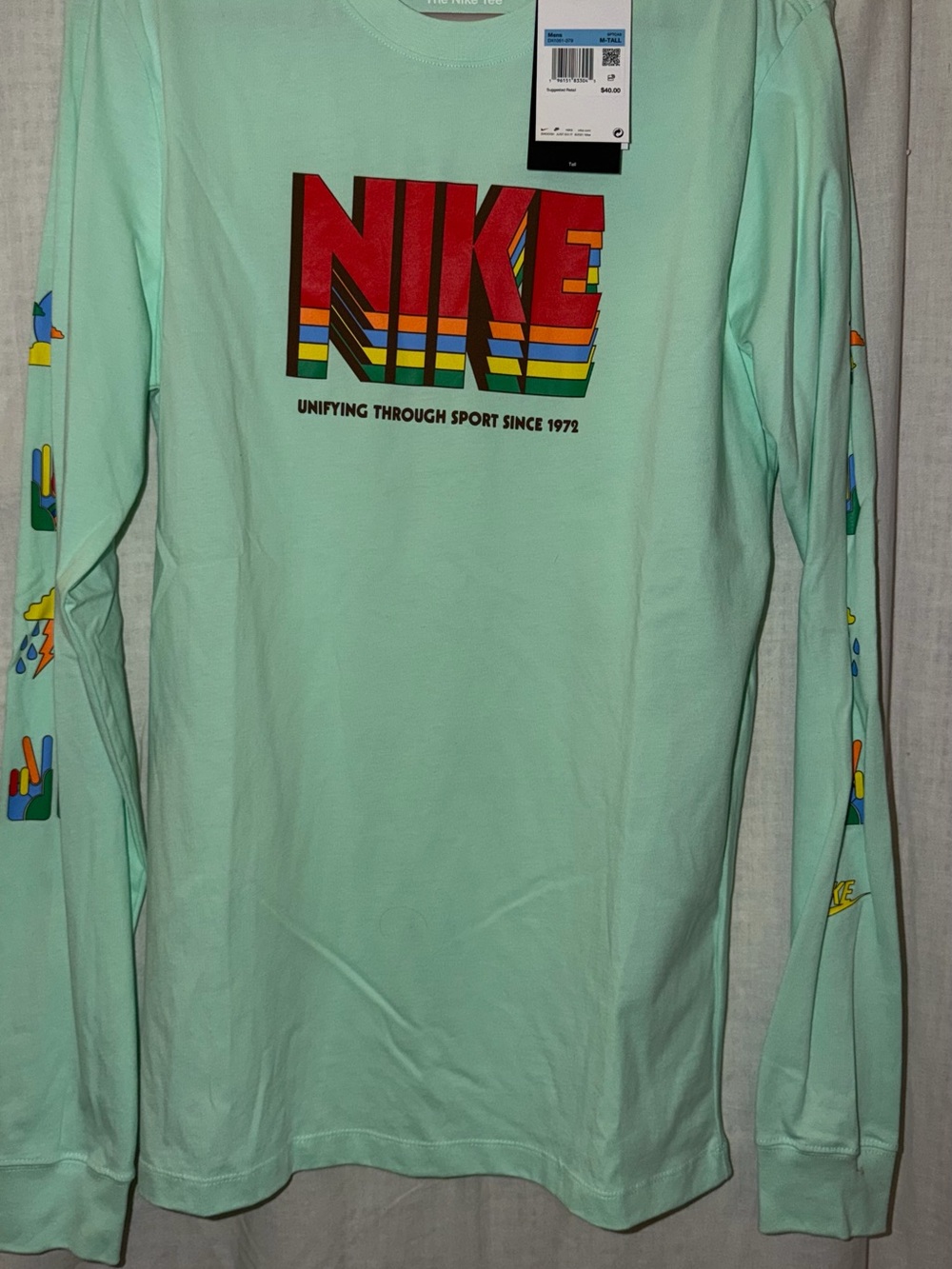 Nike Mint Green Long Sleeve Tee with Multicolor Retro Logo and Sleeve Graphics